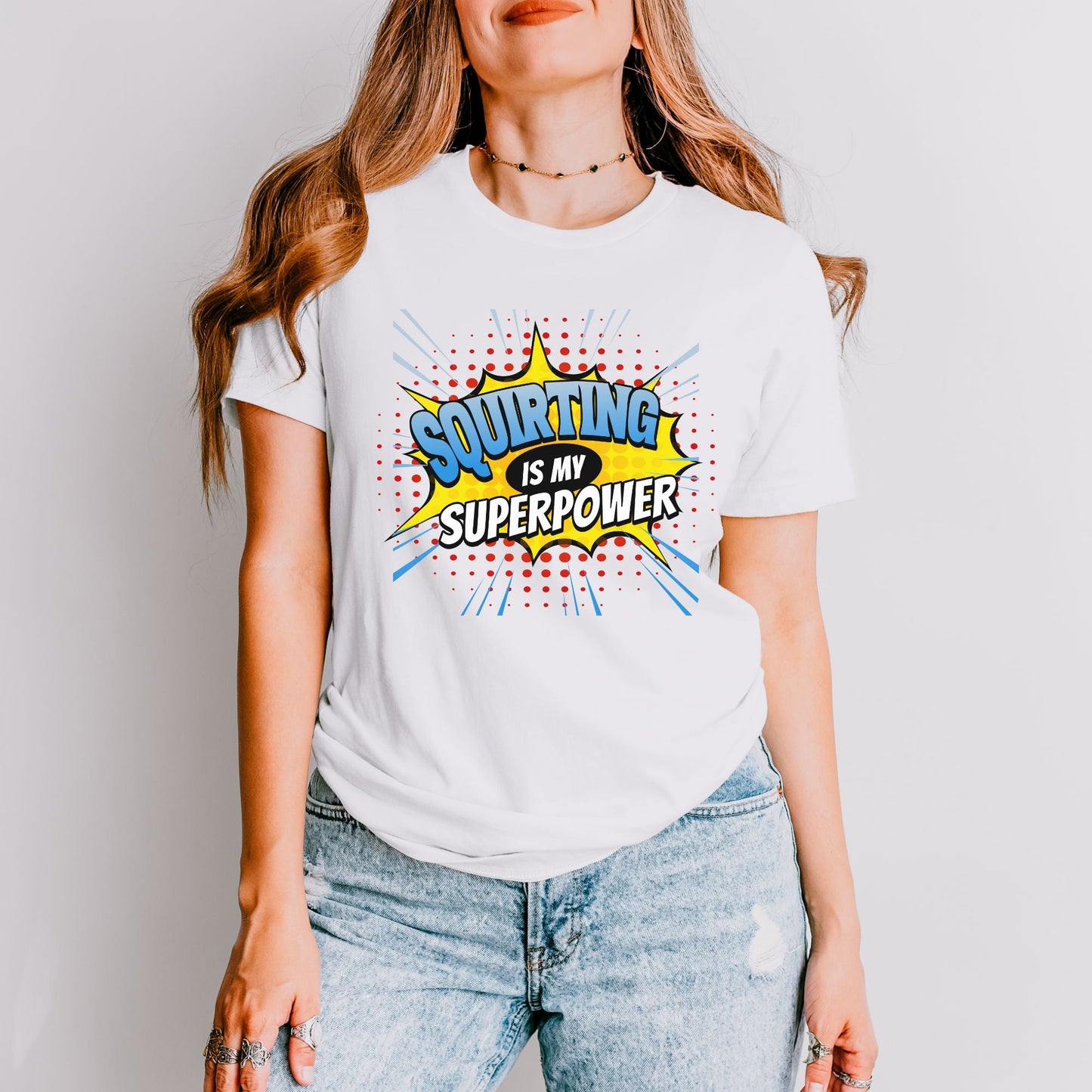 a woman wearing a white t - shirt that says surfing is my super power