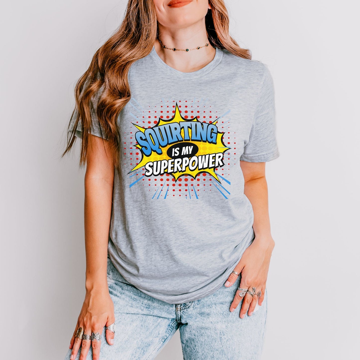 a woman wearing a t - shirt that says surfing is my super power