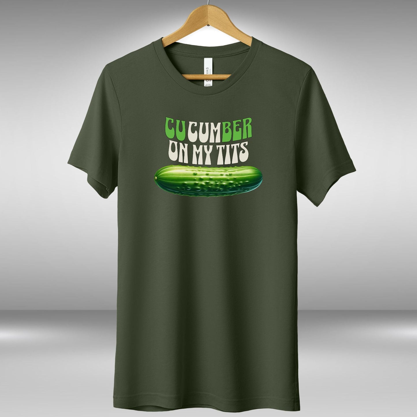 a green t - shirt that says cucumber on my tits