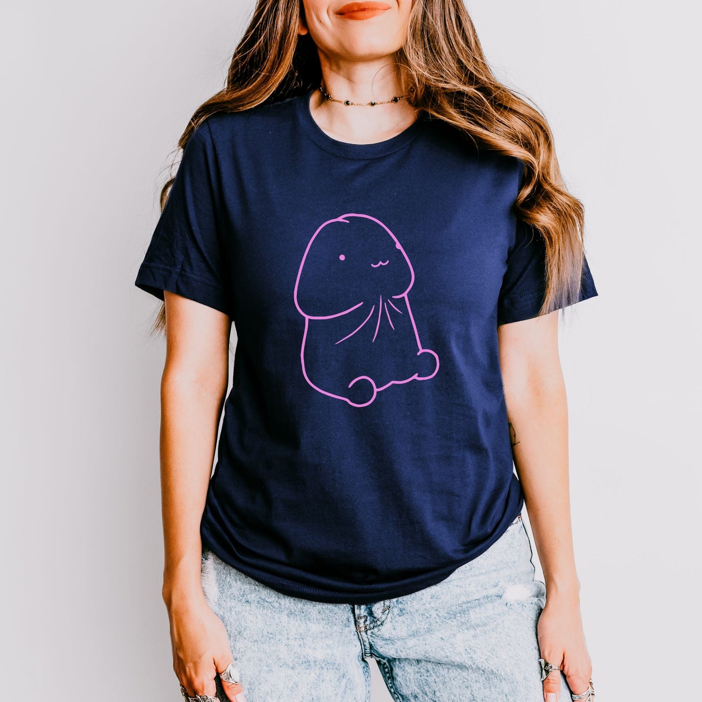a woman wearing a t - shirt with a drawing of an octopus on it