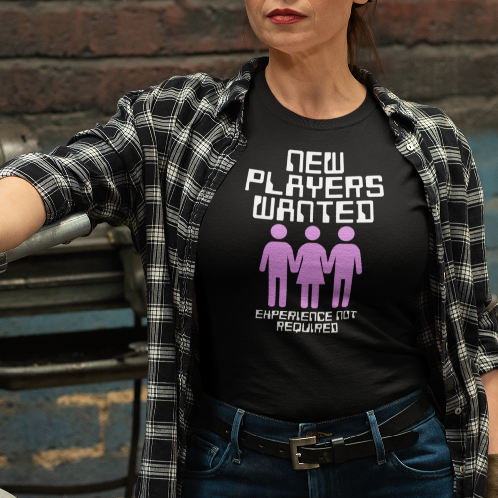 a woman wearing a new players wanted t - shirt