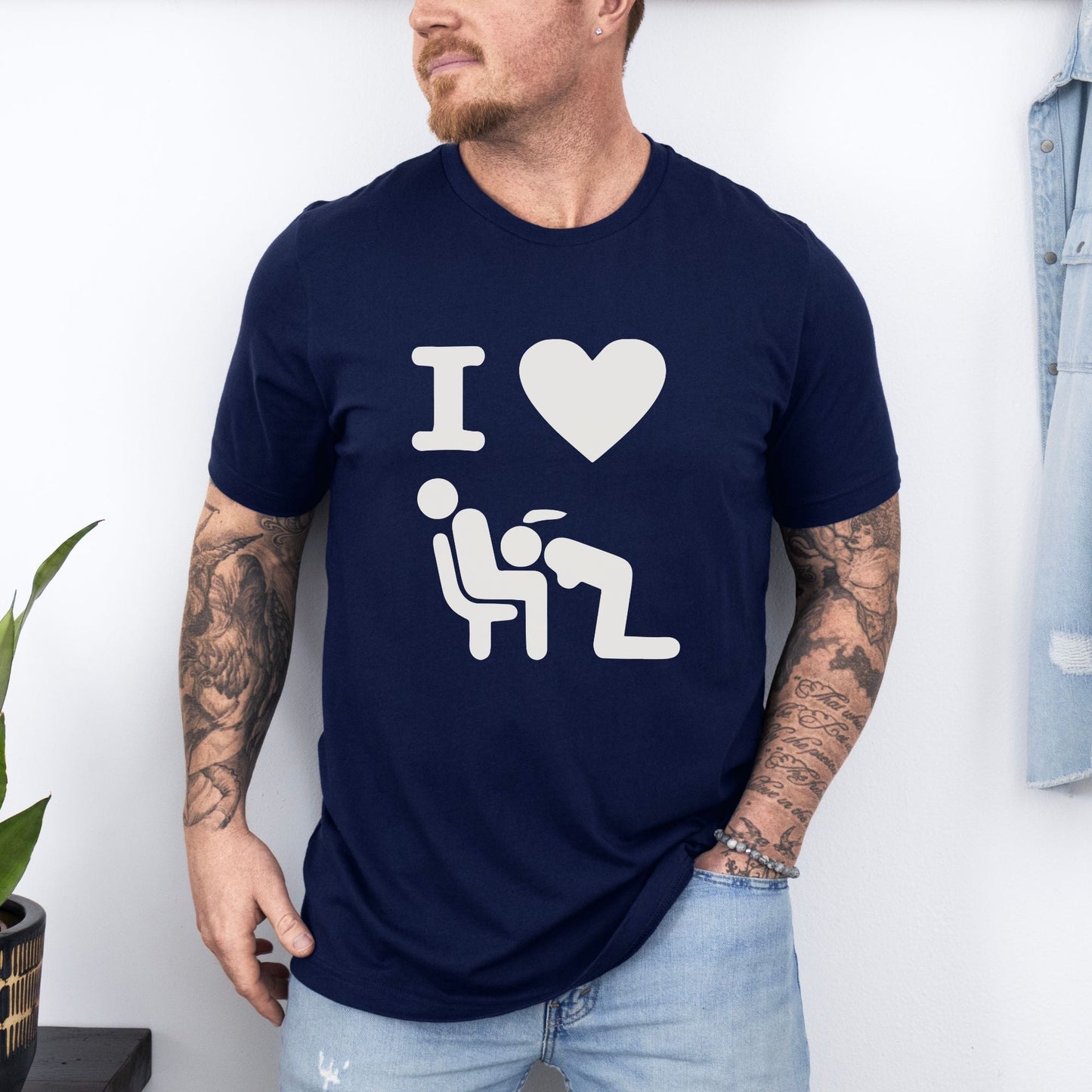 a man wearing a t - shirt that says i love him