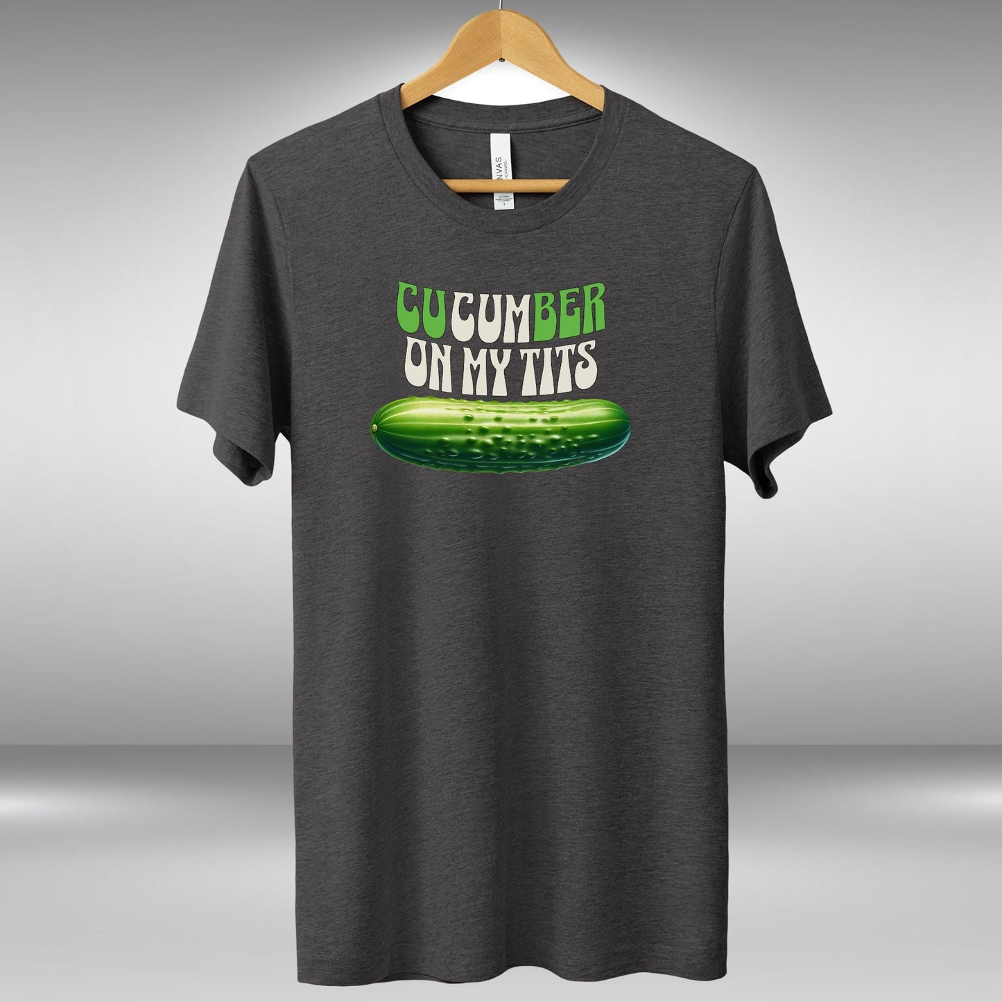 a t - shirt that says cucumber on my tits