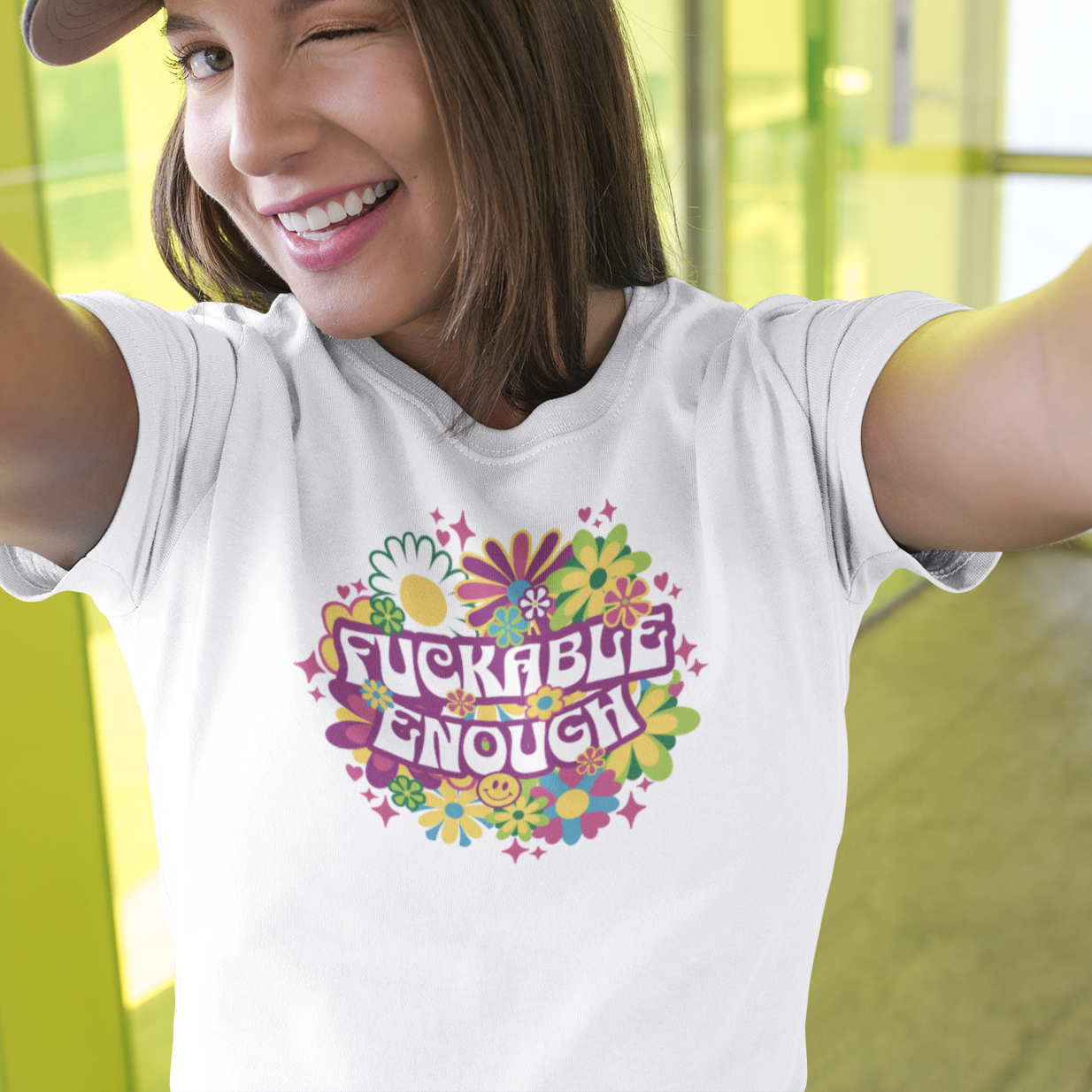 a woman wearing a t - shirt that says fucking enough