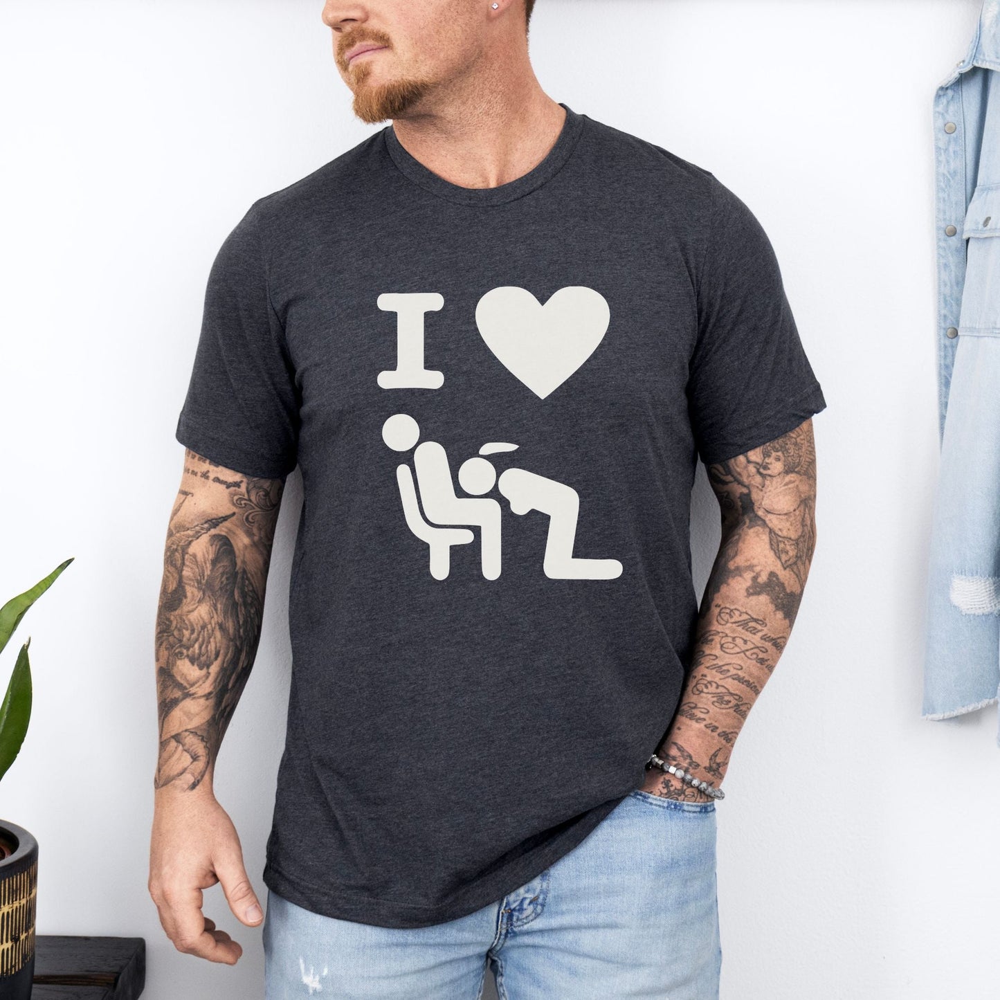 a man with a beard wearing a t - shirt with a picture of a man