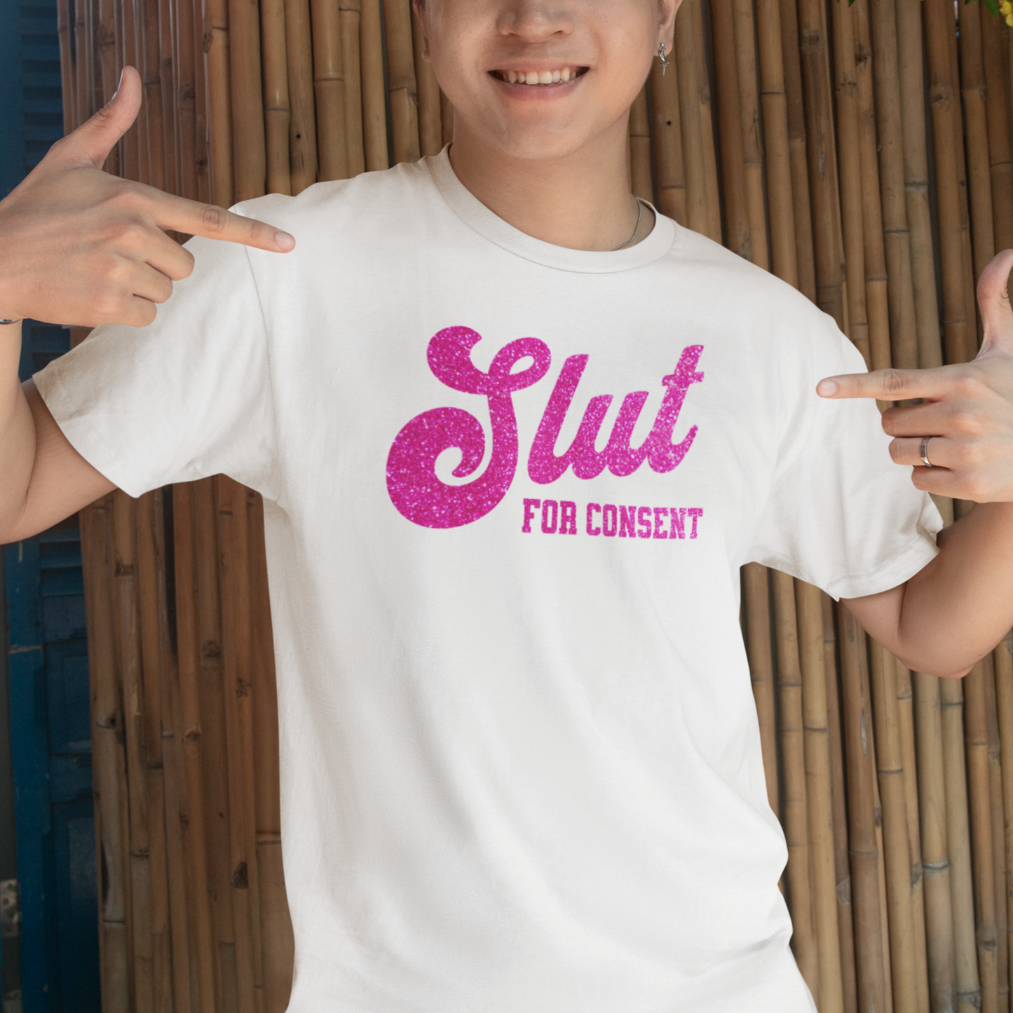 a person wearing a white shirt with pink glitter on it