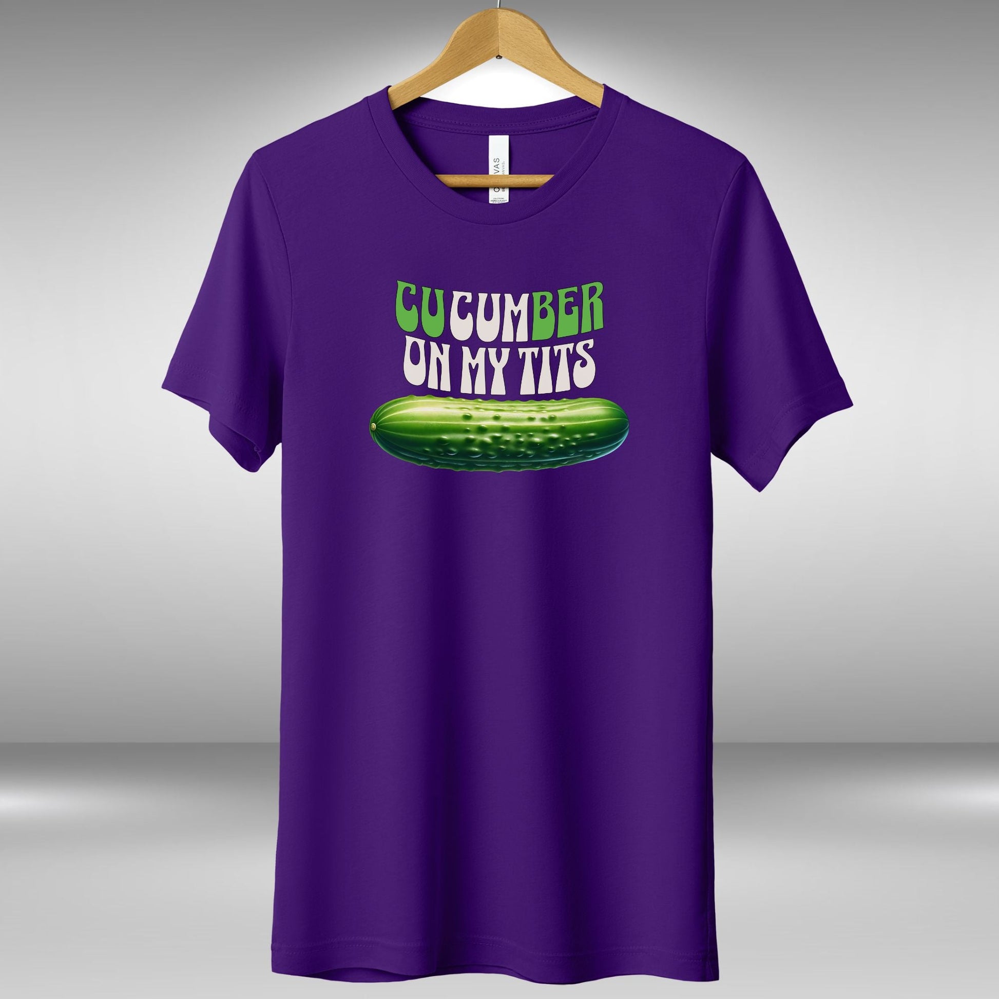 a purple shirt that says cucumber on my tits