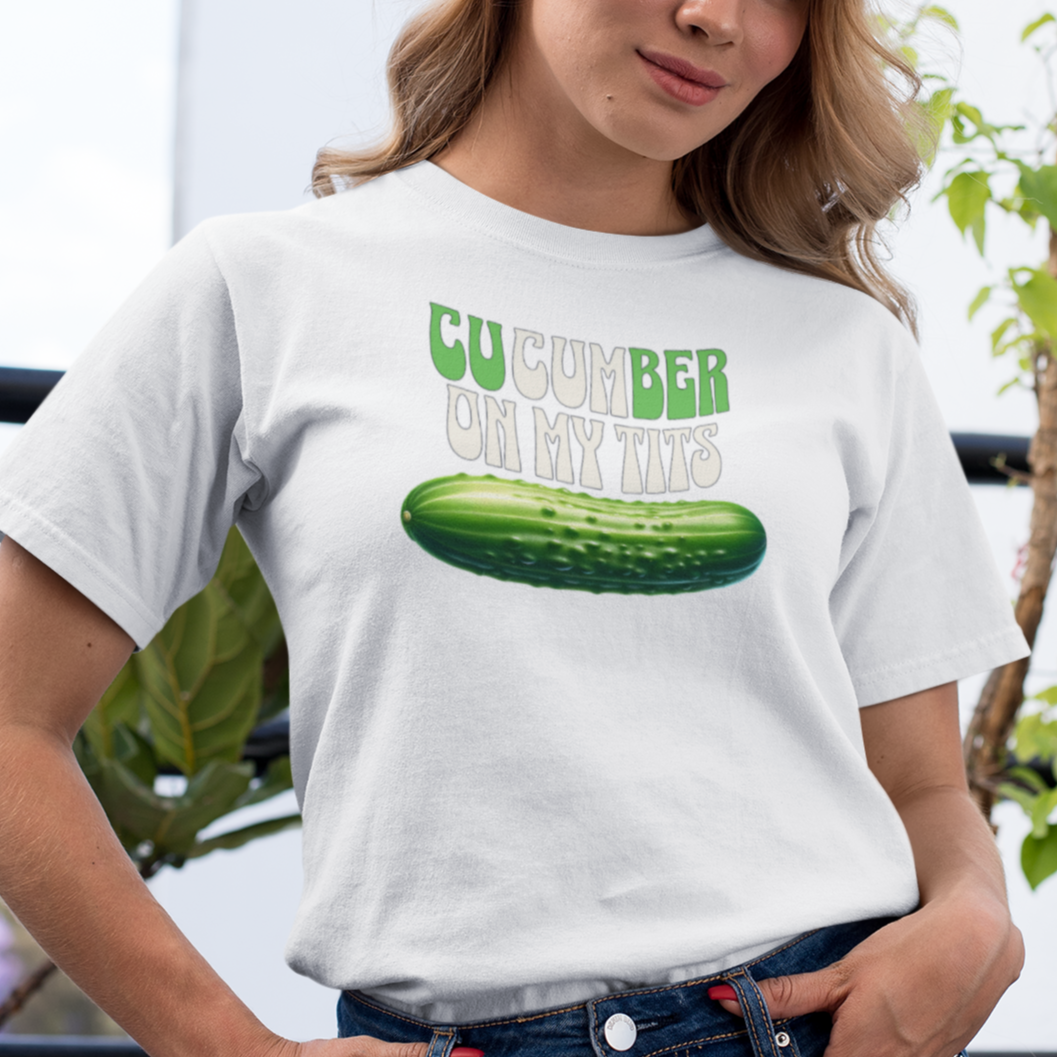 a woman wearing a white t - shirt with a cucumber on my shirt
