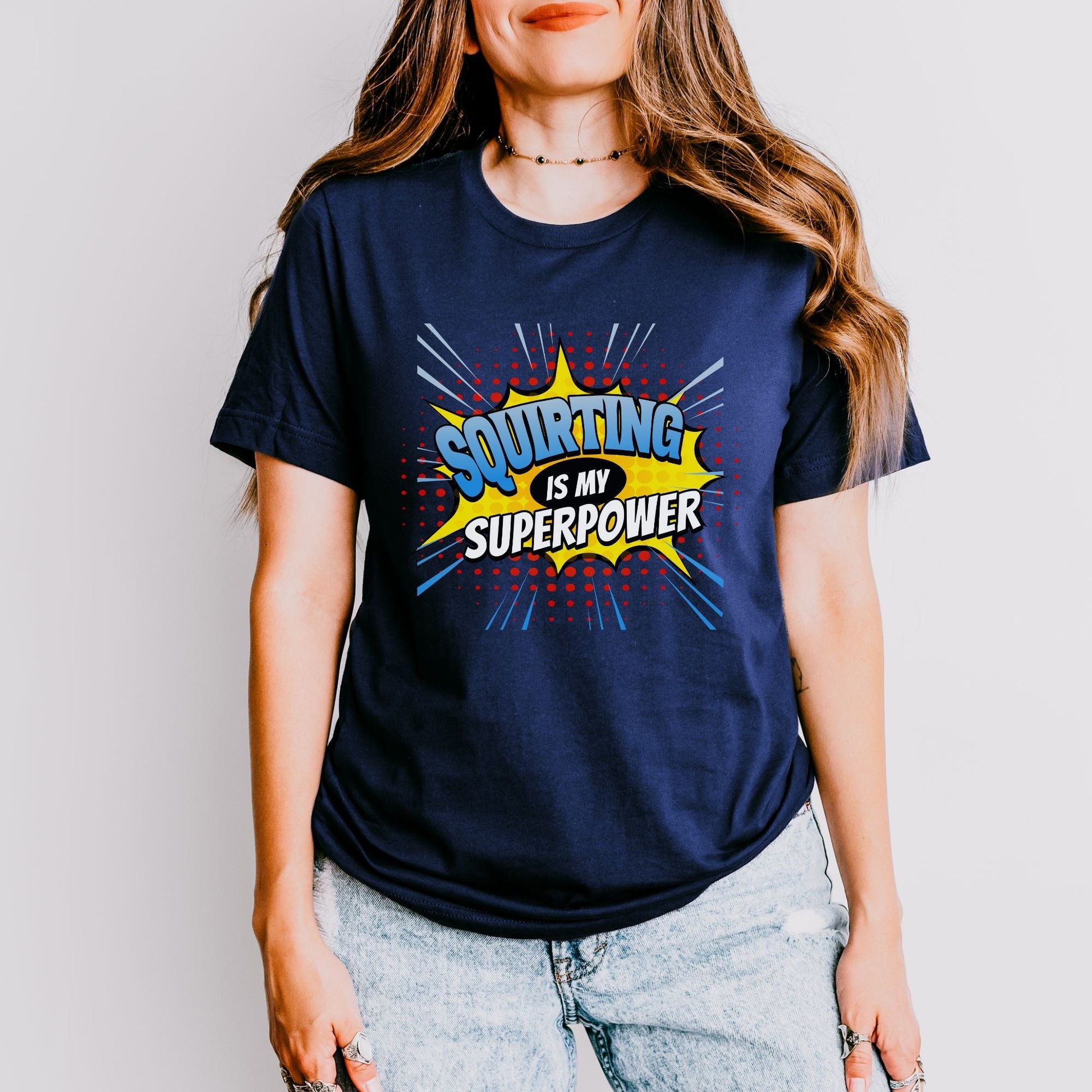 a woman wearing a t - shirt that says squirting is my super power