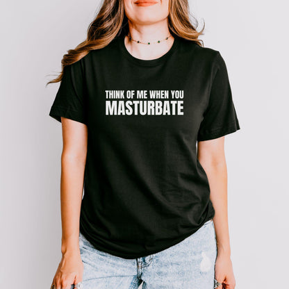 a woman wearing a black t - shirt that says, think of me when you